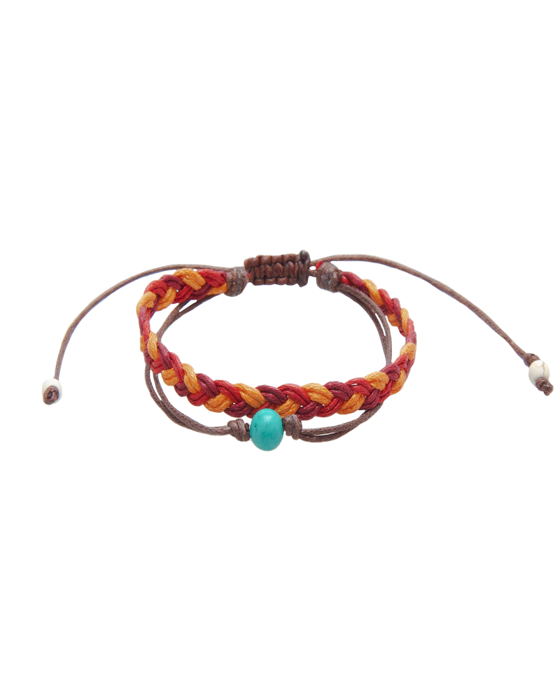 Multicolored braided bracelet with a turquoise bead on a white background