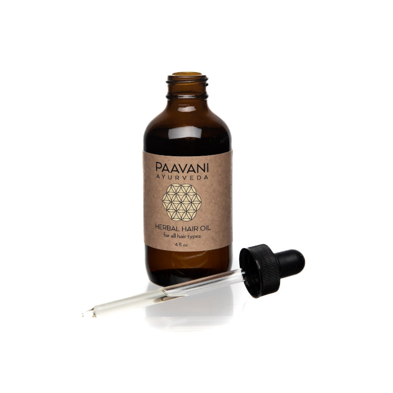 Herbal hair oil with dropper