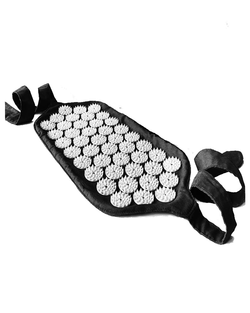 Black massage belt with white nodes on a white background