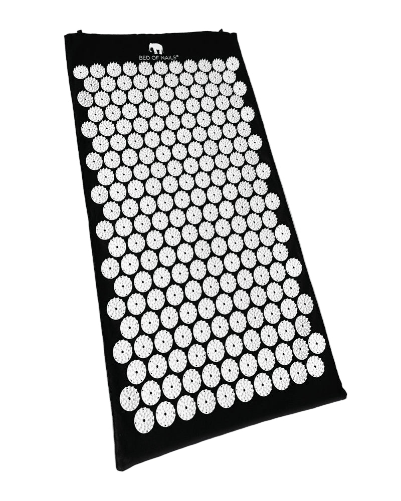 Acupressure mat with white nodes on a black background