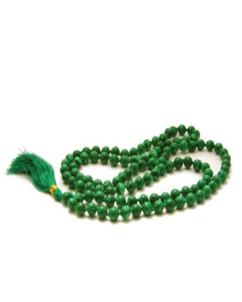 Green beaded necklace with a tassel on a white background