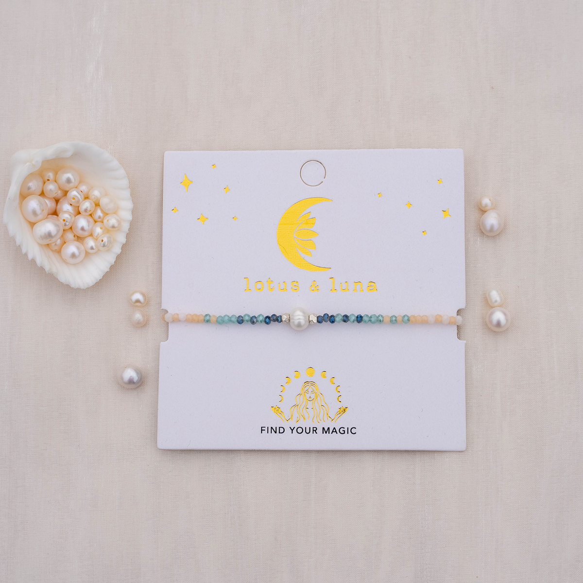 Bracelet on a 'lotus & luna' branded card with pearls around