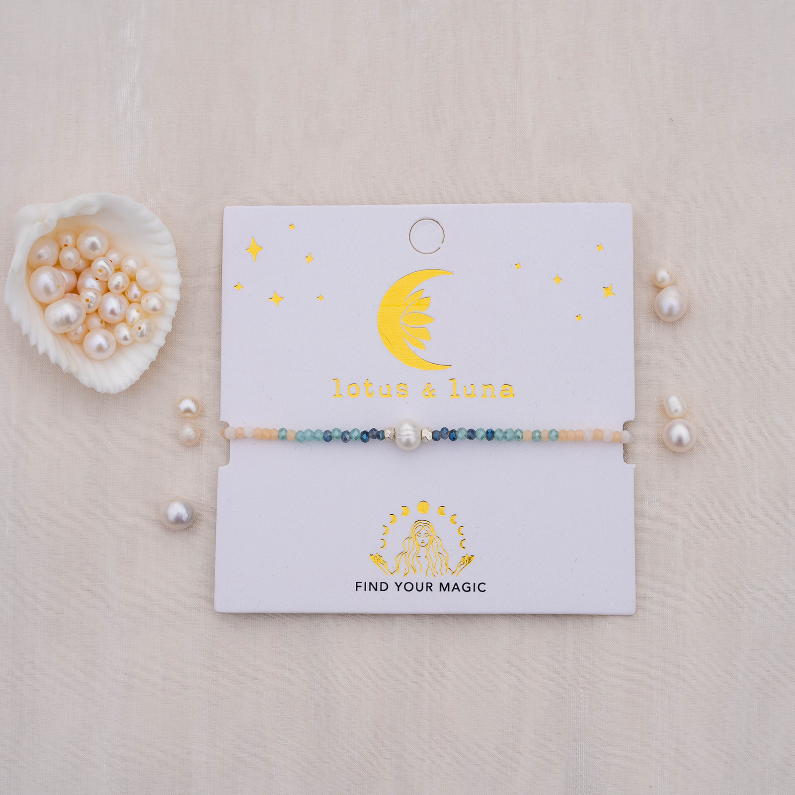 Bracelet on a 'lotus & luna' branded card with pearls around
