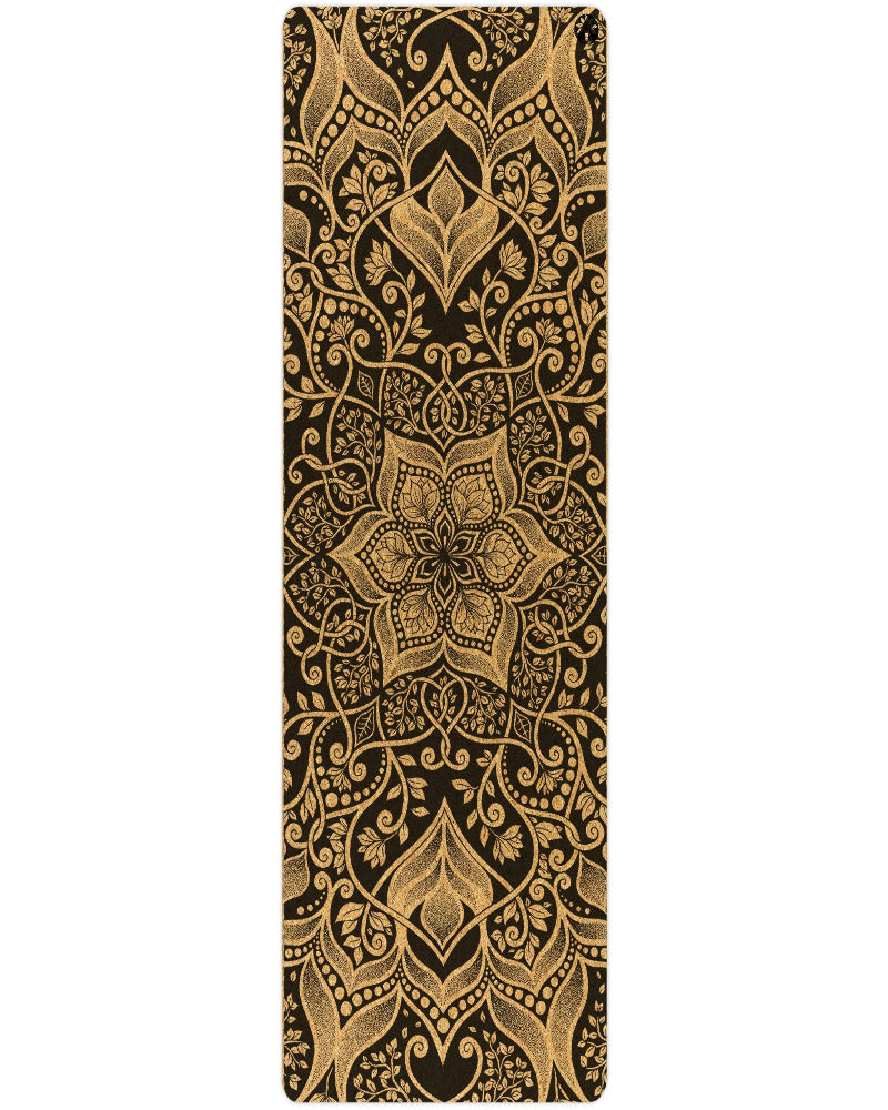 Yoga mat with gold mandala design on a black background