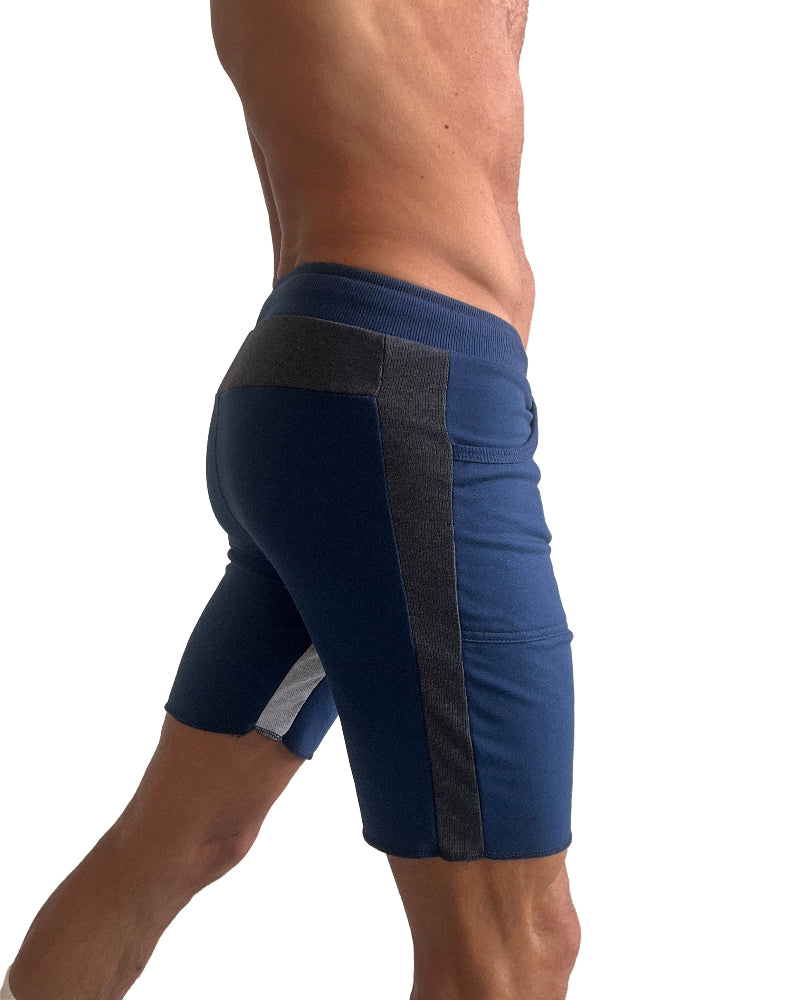 Blue athletic shorts with black accents on a white background