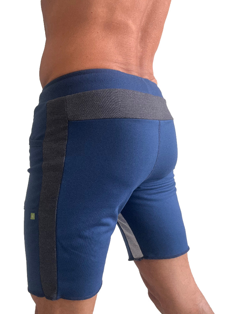 Blue athletic shorts with black and gray accents on a white background