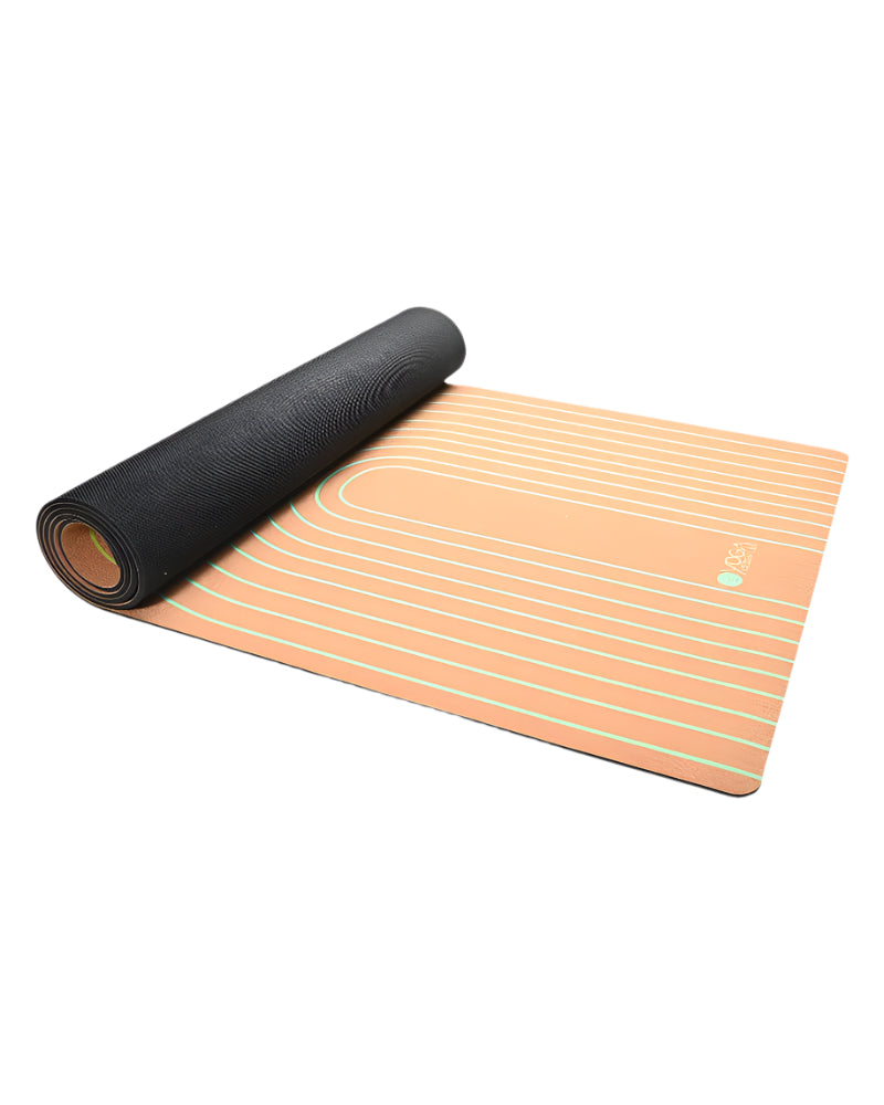 Black yoga mat rolled out on a peach-colored yoga mat with white stripes on a light gray background