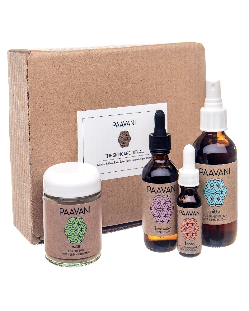 PAAVANI skincare products including jars and bottles on a white background