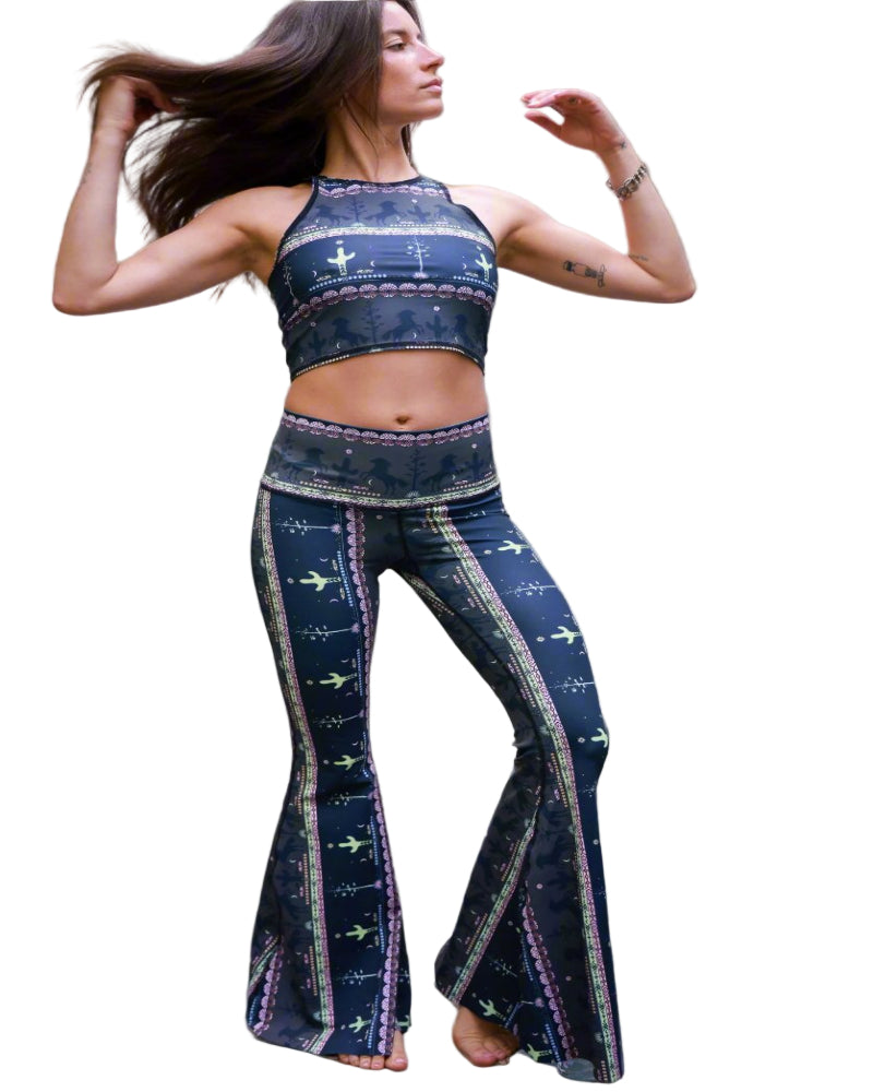 Woman wearing a blue patterned outfit on a gray background