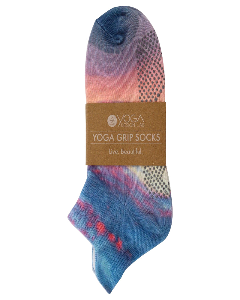 Yoga grip sock with gradient design and 'Yoga Design Lab' branding on a white background