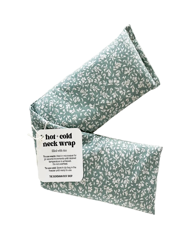 Green floral hot and cold neck wrap with label on a white background