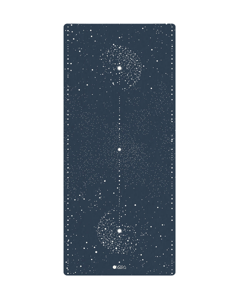 Yoga mat with starry night design on a white background
