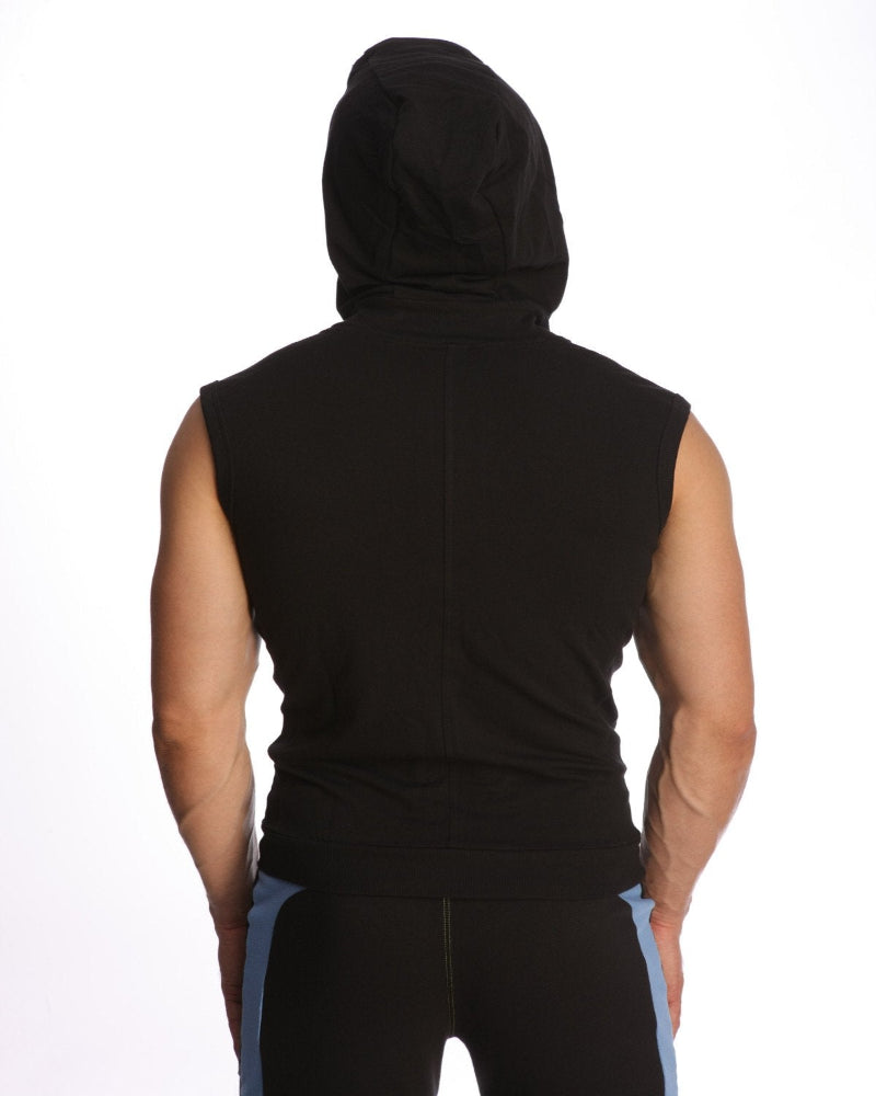 Person wearing a black sleeveless hoodie on a white background