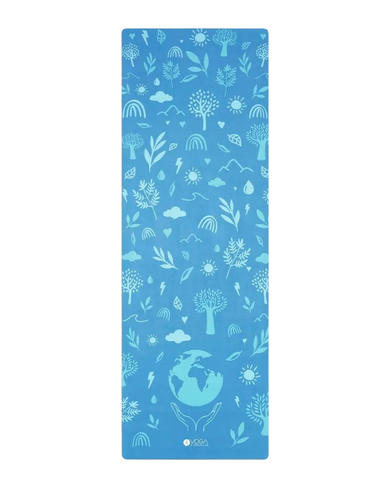Blue yoga mat with nature-themed design on a light gray background