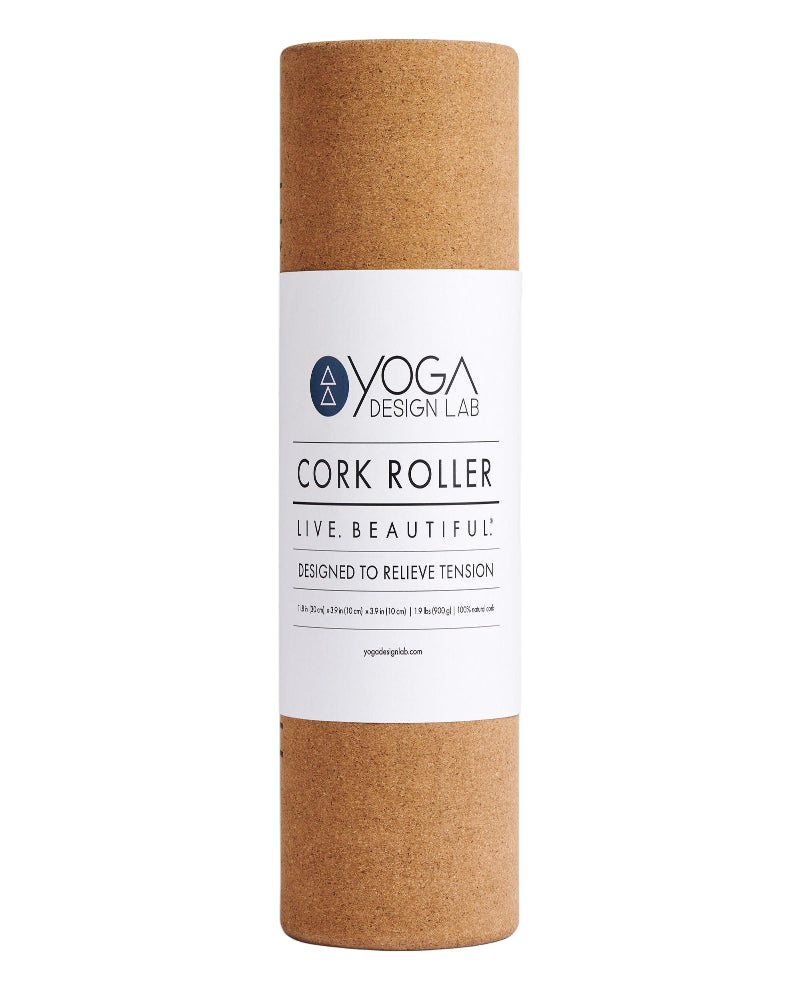 Cork yoga roller with 'Live Beautiful' text on a white background